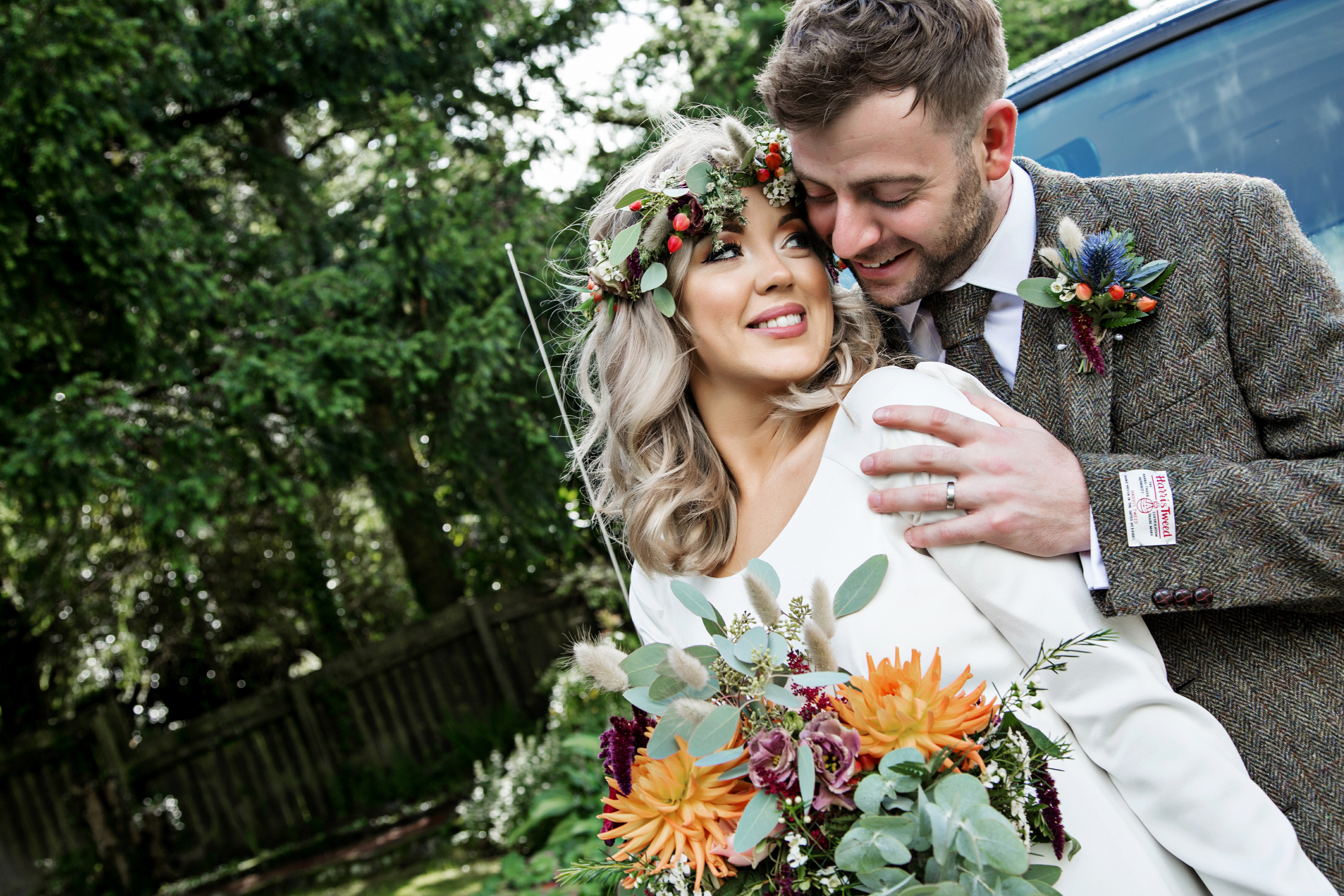 Carli wedding photos, happy couple on their wedding day, bride wearing a stunning couture dress