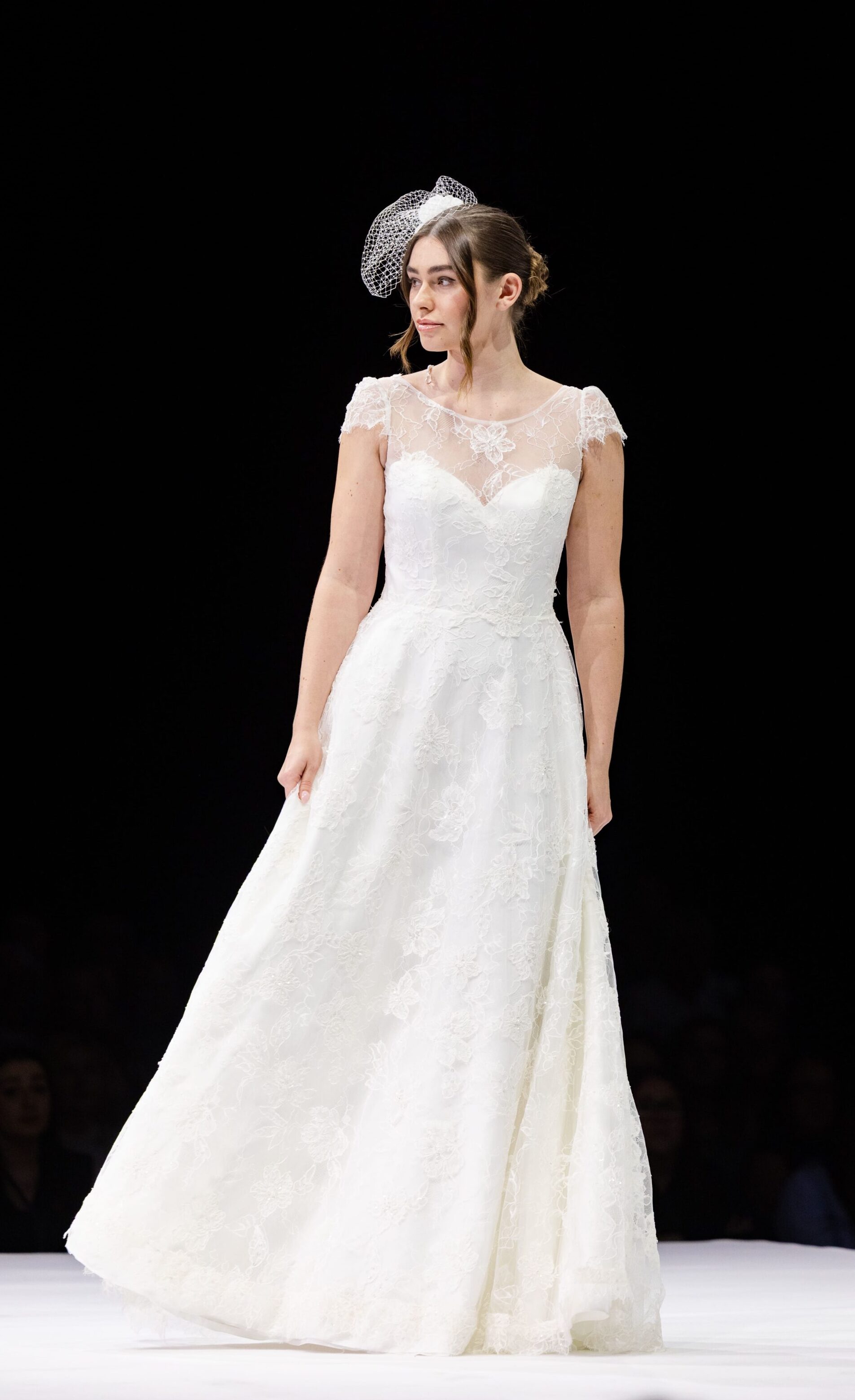 Youthful beaded lace wedding dress with dramatic back